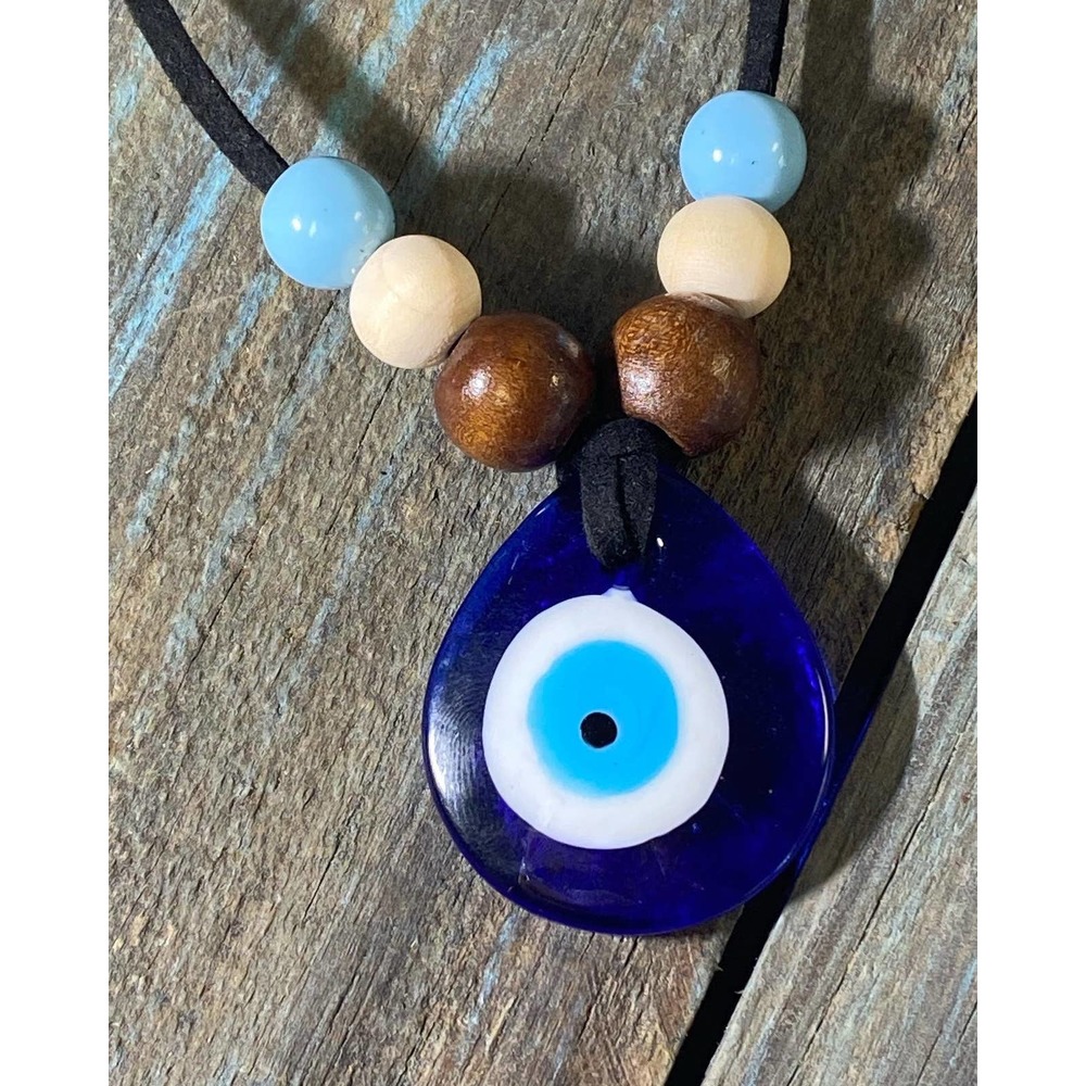 Evil eye glass charm necklace on leather cord with wooden beads